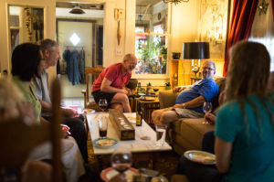 Carl Oleson and Rob Johnston of Casper, Wyoming, at home with friends. (Ryan Dorgan, Star-Tribune)